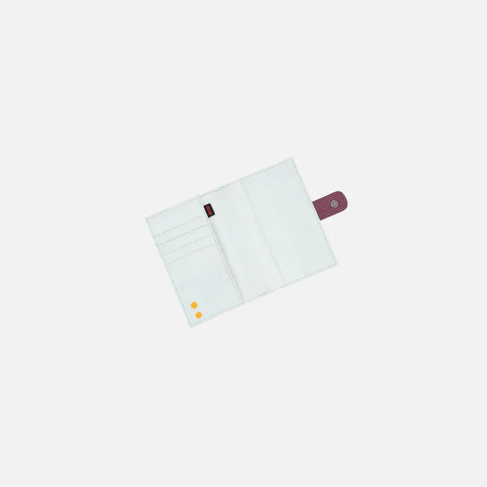 A Sherpani Vienna Smoky Orchid Anti-theft Passport Wallet, above view showing inside of wallet against white background.  #color_smoky-orchid-pink