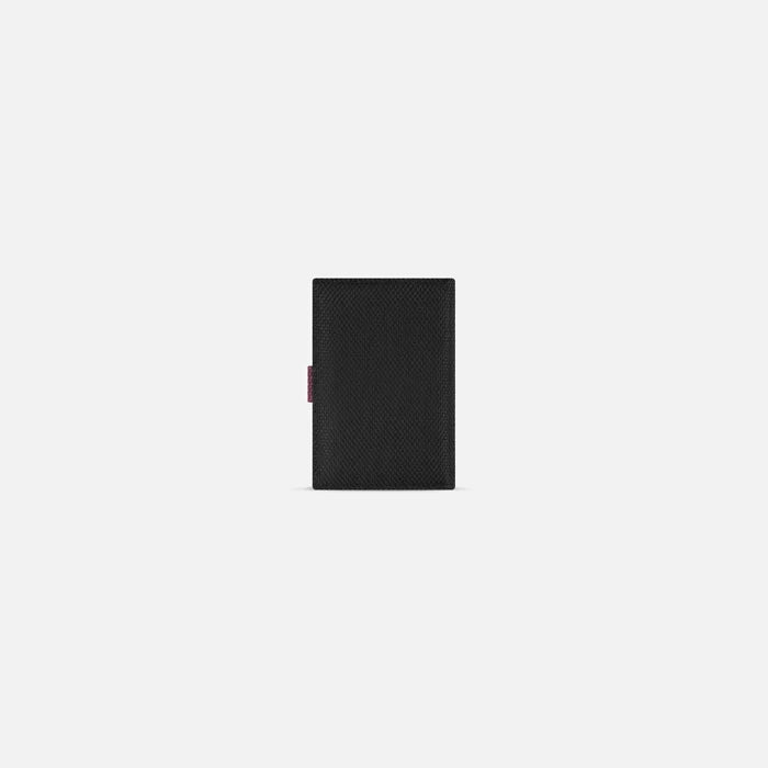 A Sherpani Vienna Smoky Orchid Anti-theft Passport Wallet, back view against white background.  #color_smoky-orchid-pink