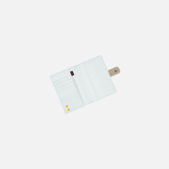 A Sherpani Vienna Straw Beige Anti-theft Passport Wallet, above view showing inside of wallet against white background.  #color_straw-beige
