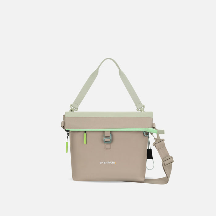 A Sherpani Viso Desert Aloe Foldover Bag, front view showing folded over front on white backdrop.  #color_desert-aloe