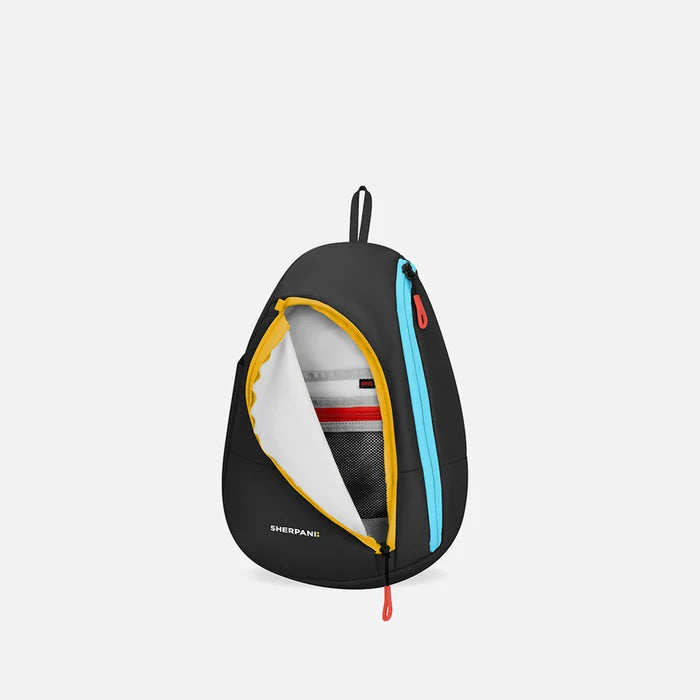 A Sherpani Wayfarer Chromatic Black Convertible Sling, front view showing inside pocket against white background.   #color_chromatic-black