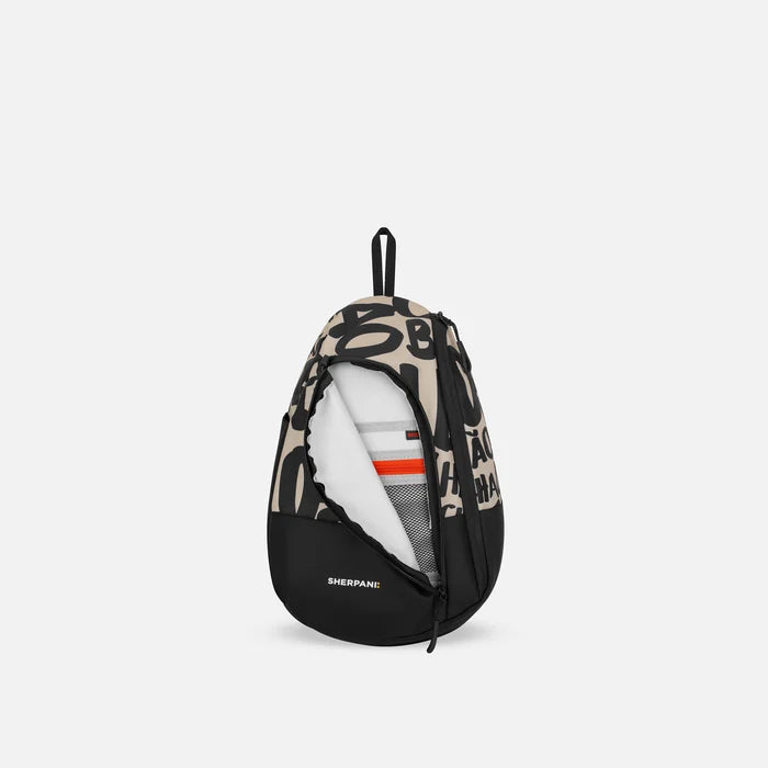 A Sherpani Wayfarer Ciao Convertible Sling, front view showing inside pocket against white background.   #color_ciao-print