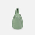 A Sherpani Wayfarer Olivine Convertible Sling, front view showing lockable pockets and main strap on white background. #color_olivine-green