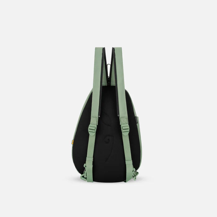 A Sherpani Wayfarer Olivine Convertible Sling, back view showing convertible strap against a white background.  #color_olivine-green