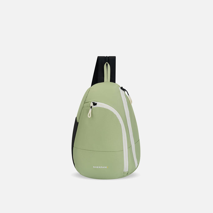 A Sherpani Wayfarer Palm Green Convertible Sling, front view showing lockable pockets and main strap on white background. #color_palm-green