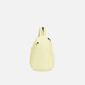 A Sherpani Wayfarer Sol Yellow Convertible Sling, front view showing lockable pockets and main strap on white background. #color_sol-yellow