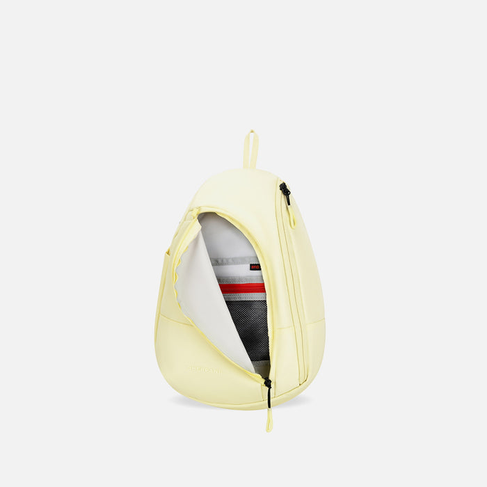 A Sherpani Wayfarer Sol Yellow Convertible Sling, front view showing inside pocket against white background.  #color_sol-yellow