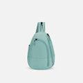 A Sherpani Wayfarer Surf Blue Convertible Sling, front view showing lockable pockets and main strap on white background. #color_surf-blue