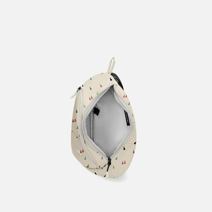 A Sherpani Wayfarer Terrazzo Print Convertible Sling, above view showing inside of main pocket against white background. #color_terrazzo-print