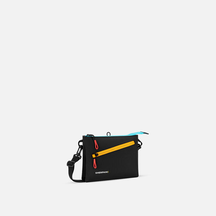 A Sherpani Zoom Chromatic Black Slim RFID Crossbody, 3/4 view showing lockable pocket and two main pockets on white background. #color_chromatic-black