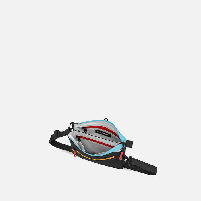 A Sherpani Zoom Chromatic Black Slim RFID Crossbody, above view showing inside the two main pockets against white background.  #color_chromatic-black