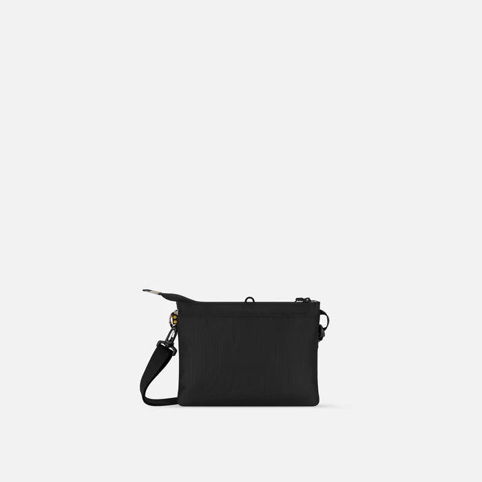A Sherpani Zoom Ciao Slim RFID Crossbody, back view against white background. #color_ciao-print