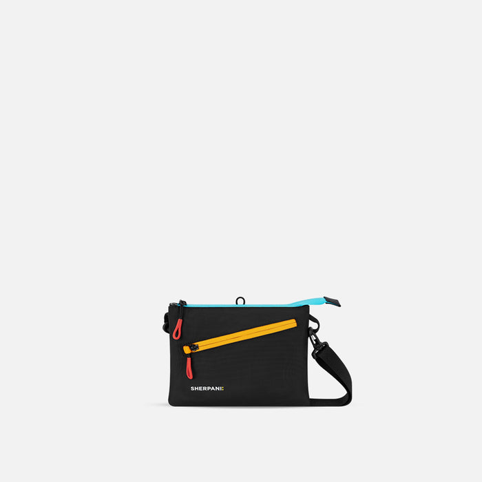 Black Sherpani crossbody bag with colorful zipper on a white background #color_chromatic-black
